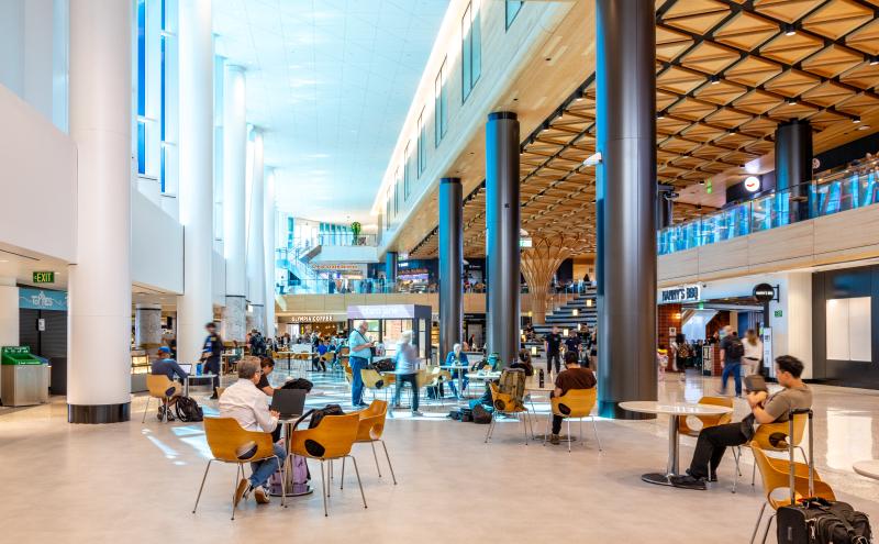 C Concourse area with several stories of shops and restaurants with large open area for seating