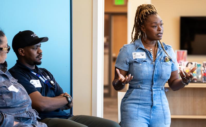 LaCretiah Clayor (right) speaks to Rainier Beach High School students, while Port employees participate in a career panel.
