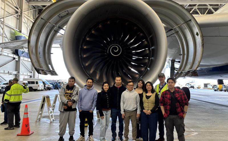 Khmer Community Seattle and King County youth on an airfield tour at SEA in April 2026