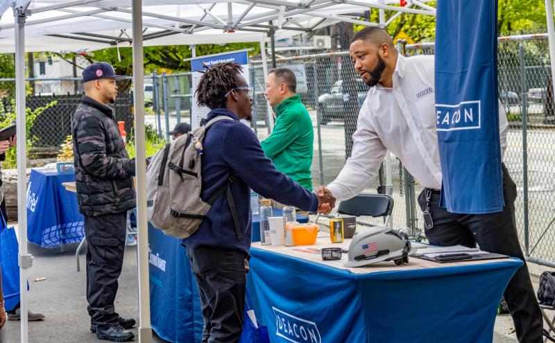 Job seeker meeting an employer at the Port Pathways Job Fair in April 2026