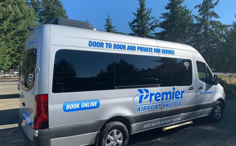 Premier Airport shuttle outdoor near trees