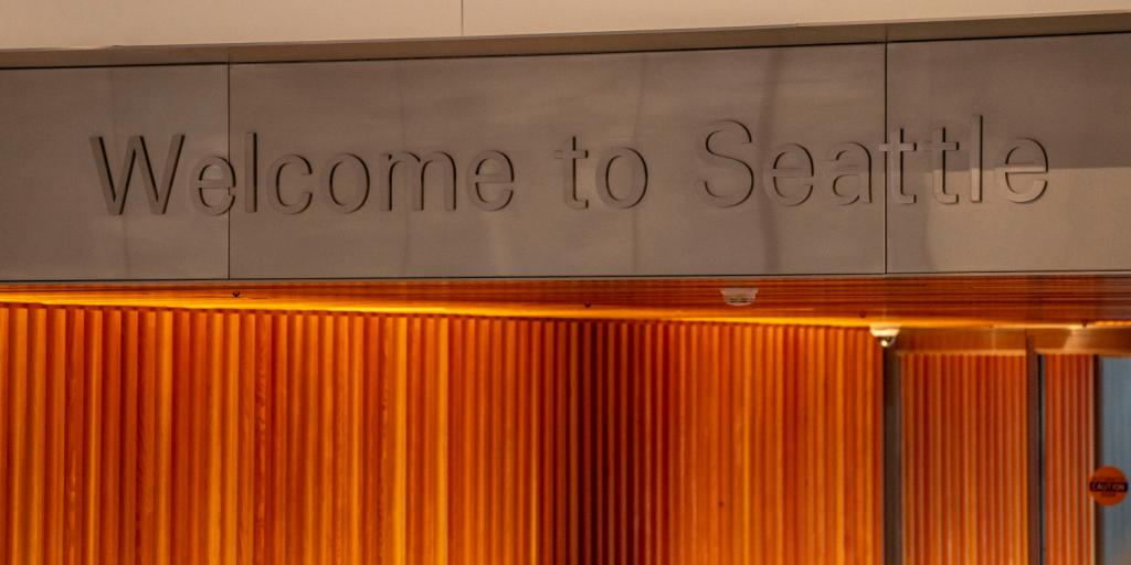 'Welcome to Seattle' sign at SEA Airport
