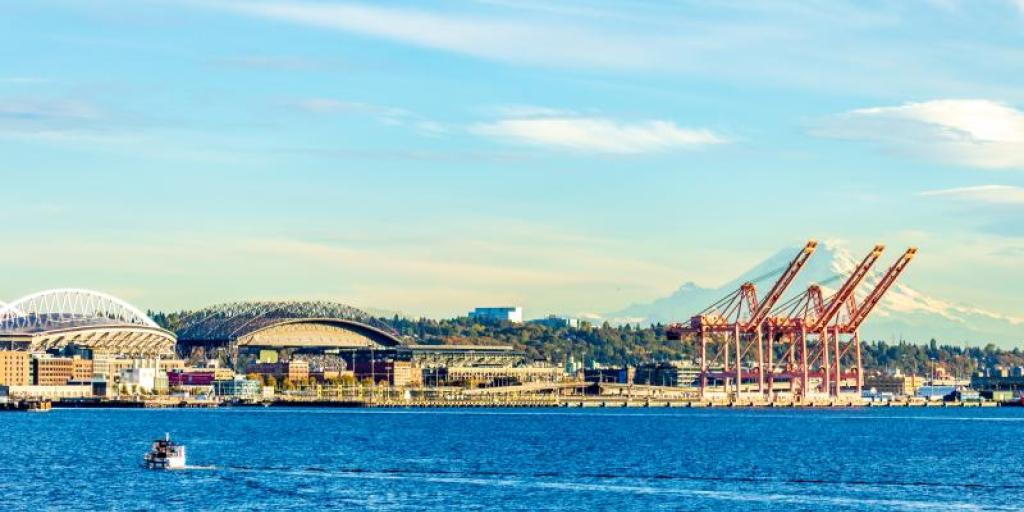 Elliott Bay and the southern Seattle waterfront with Mount Rainier in the background