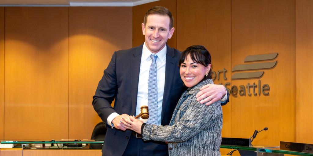 Former Commission President Toshiko Hasegawa passes the gavel to Ryan Calkins, new Commission President for 2026