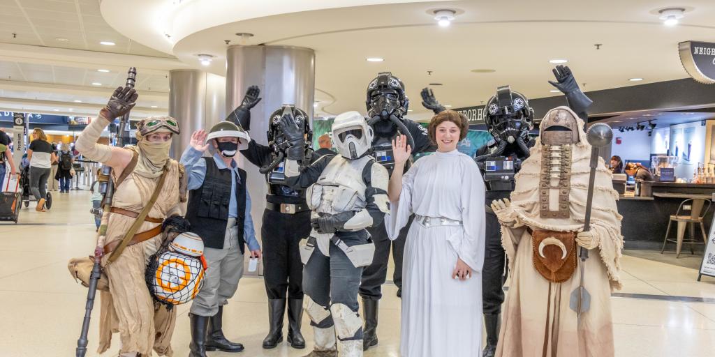 Cosplayers dressed as Star Wars characters pose in the SEA airport terminal
