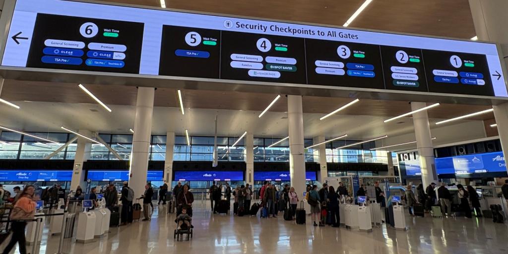 New gates at SEA Airport with wait times displayed