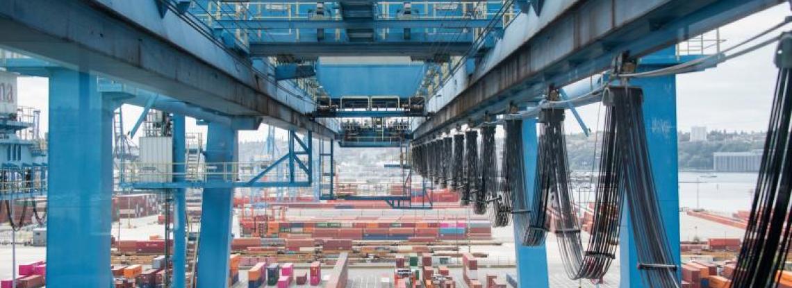 Image of container ships and a crane