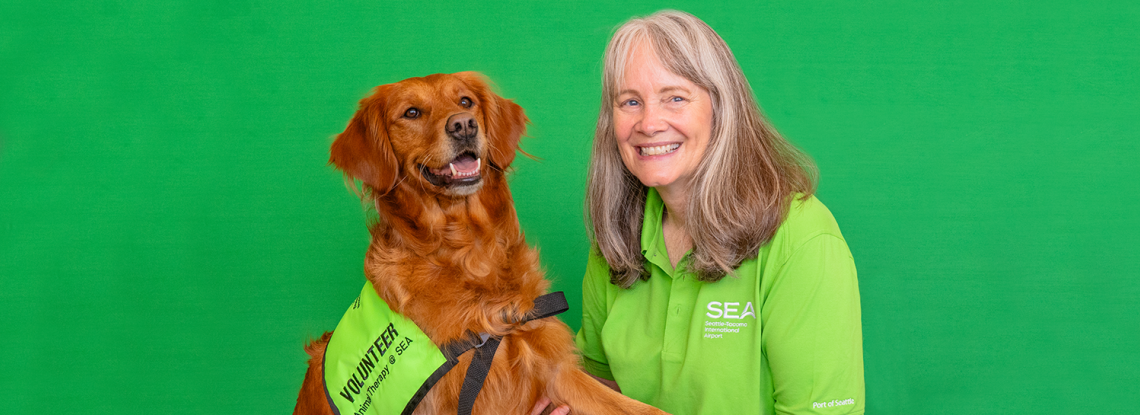 Keena the SEA Pup and handler Val.