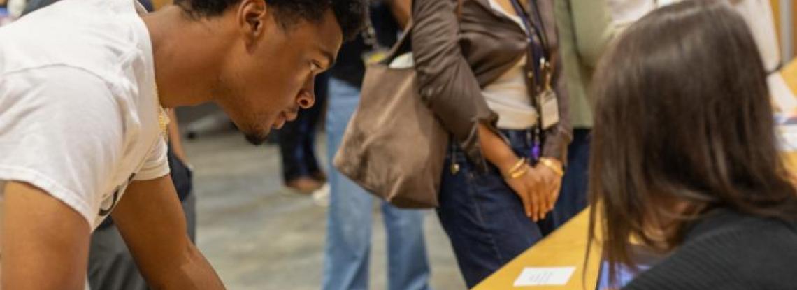 High School student talking to fellow student 