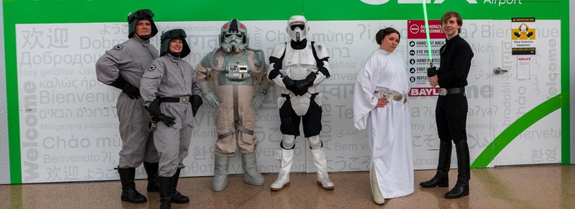 Cosplayers dressed as Star Wars characters pose in the SEA airport terminal