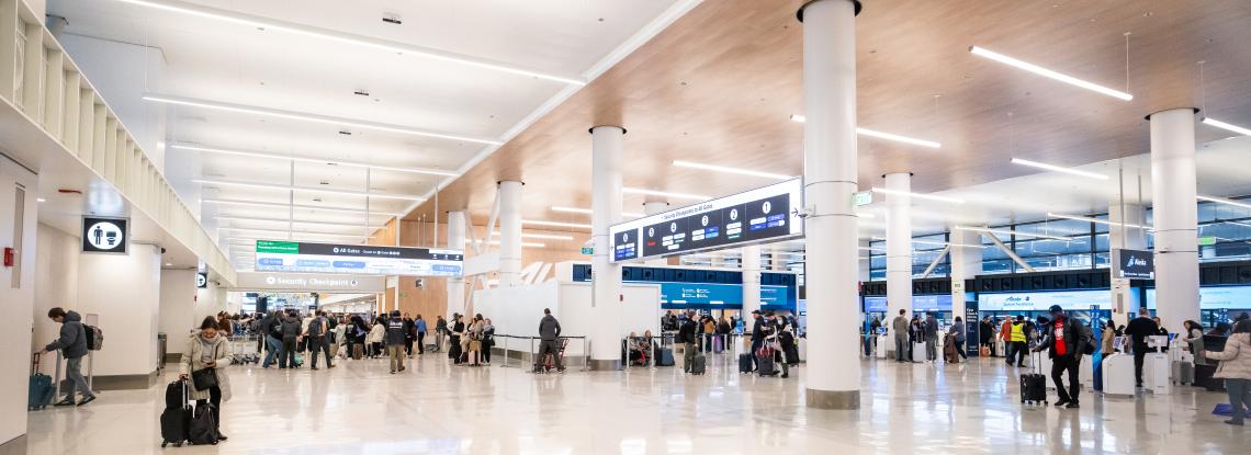 The new signage over gates at SEA airport with wait times displayed