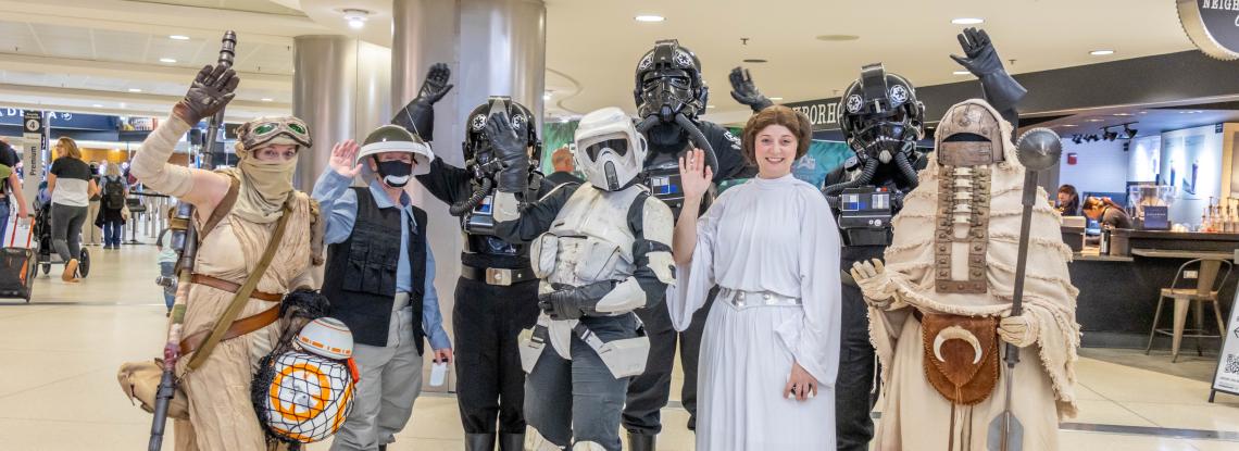 Cosplayers dressed as Star Wars characters pose in the SEA airport terminal