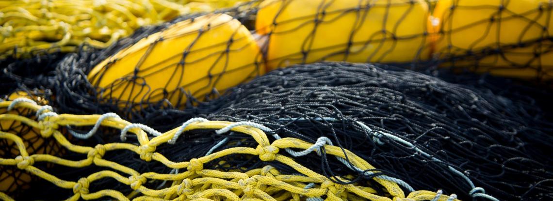 Close up of a fishing net and yellow floats