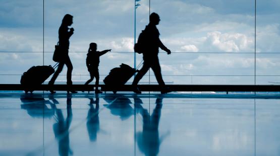 Family walking at Sea-Tac Airport