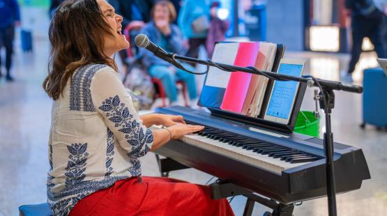 Kristin Chambers passionately playing the piano at Sub Pop.