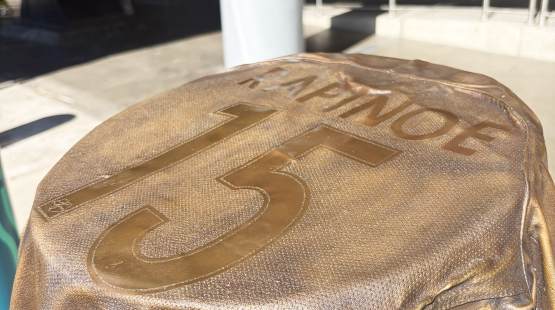 bronze artwork of Megan Rapinoe's jersey