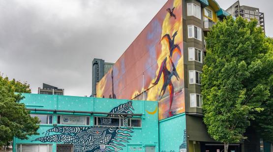 "Luna" and "Jurassic Park Murals" brighten an intersection in Belltown.