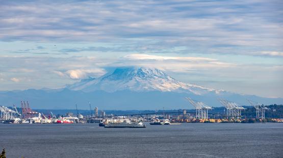 View of Mount Rainier, cargo terminals, and Elliott Bay from Magnolia.