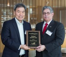 Port of Seattle CEO Tay Yoshitani presents the Green Gateway Award to Princess Cruise Line