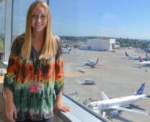 Headshot of Brittany Maben in front of the Airfield