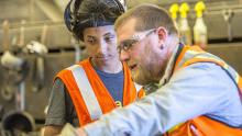 Shop worker mentors a youth intern