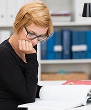 Woman reading manual 