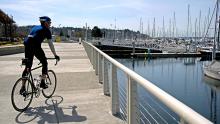 Bicyclist at Shilshole Bay Marina