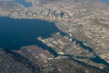 Aerial view of the Port of Seattle facing East showing the Seattle waterfront