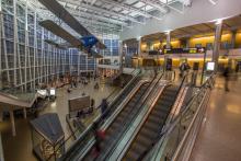 View of The Conference Center from the Ticketing level with the Airplane suspended in Gina Marie Lindsey Hall and escalators
