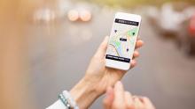 Cell phone with ride sharing app open