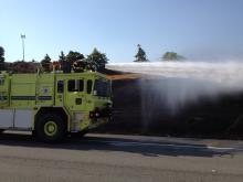 ARFF Truck extinguishes brush fire