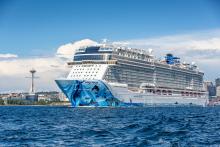 Norwegian Bliss cruise ship sailing out of Elliott Bay in Seattle