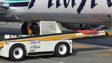 Electric Ground Support Vehicle aside an Alaskan Aircraft, Sea-Tac Airport, April 2014