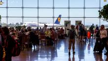 Passengers in the Central Terminal at Seattle-Tacoma International Airport, Washington