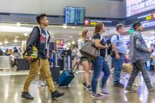 Passengers walking near Checkpoint 3 at Sea-Tac Airport