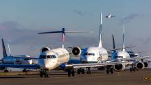 Aircraft on the taxiway at Sea-Tac Airport await takeoff