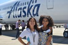 Two interns at a networking event at Sea-Tac airport