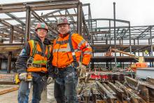 Construction workers on the North Satellite 