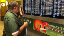 Larry Watkinson uses Aira assistive technology to help him navigate SEA.