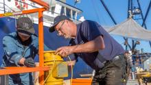 Men working at the Maritime Industrial Center shipyard on Salmon Bay, Seattle, October, 2016