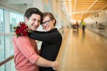 Couple embraces at SEA. The couple were participants in the SEA Visitor Pass program that lauched Dec. 16, 2019