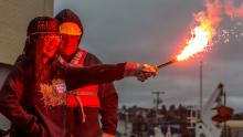 Student learns about using a flare at the youth maritime expo, March 2018