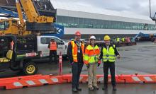 Commission President Peter Steinbrueck visits the IAF Bridge lift with Port of Seattle Project Manager Steven St. Louis and Engineer Sarah Mitchell