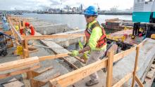 Construction worker on Terminal 5 modernization project to make the terminal "big ship ready", July 2019, Seattle