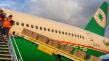 EVA Air jet loading cargo into passenger cabin
