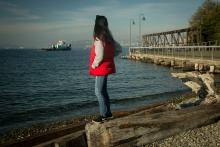Visitor at Jack Block Park looking at the waterfront
