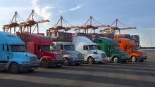 Trucks at a shipping yard