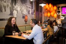 Customers dining at a restaurant at SEA