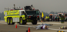 SEA fire truck and personnel exercise emergency response on the airfield