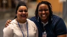 two women with broad smiles at the MLK Celebration at Port of Seattle Headquarters 2020